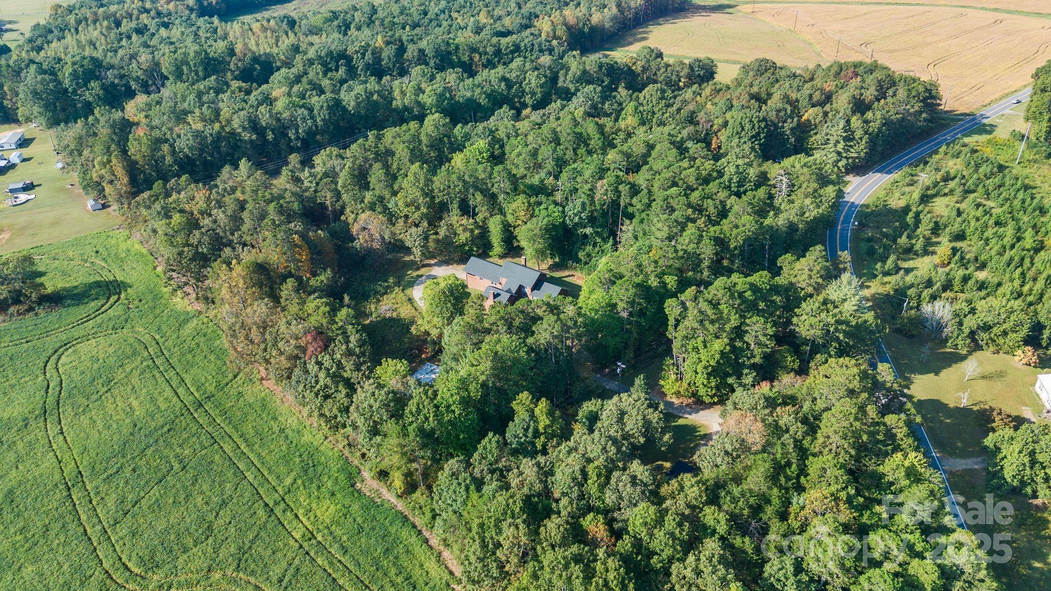 1653 Dudley Shoals Road Granite Falls, NC 28630 - Photo 43 of 48 an aerial view of residential houses with outdoor space and trees