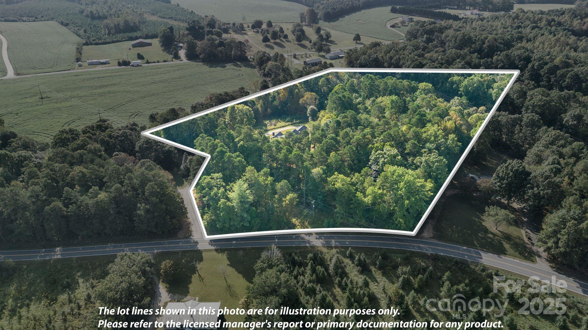 1653 Dudley Shoals Road Granite Falls, NC 28630 - Photo 44 of 48 a view of a yard with a street view