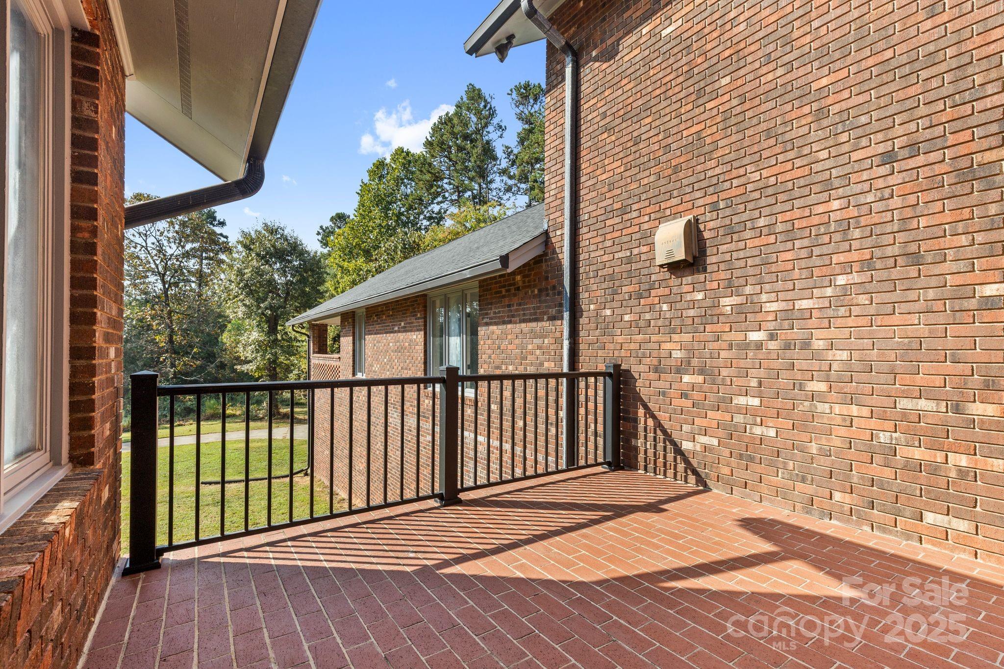1653 Dudley Shoals Road Granite Falls, NC 28630 - Photo 6 of 48 a view of a balcony with wooden floor