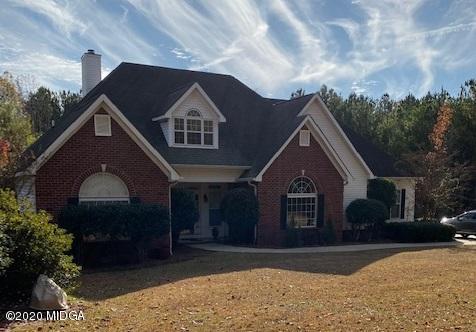 577 Old Popes Ferry Road Juliette, GA 31046 - Photo 1 of 49 a front view of a house with a yard
