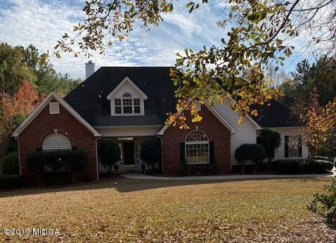 577 Old Popes Ferry Road Juliette, GA 31046 - Photo 2 of 49 a front view of a house with a yard