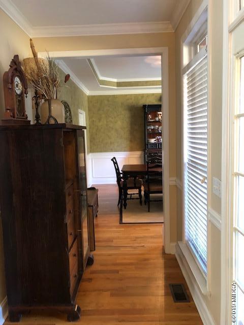 577 Old Popes Ferry Road Juliette, GA 31046 - Photo 11 of 49 a view of a hallway with wooden floor and a window