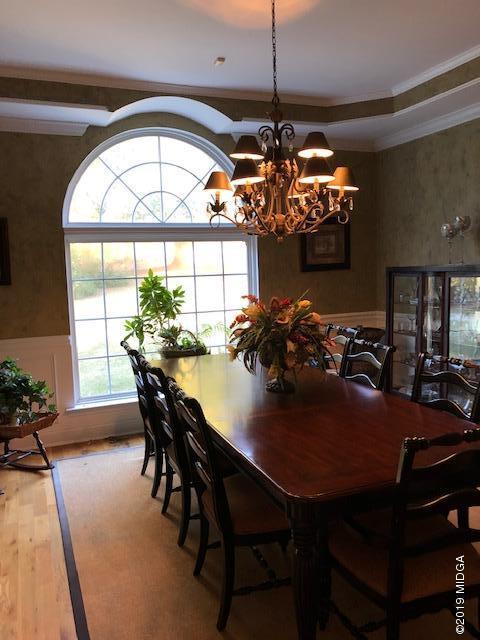 577 Old Popes Ferry Road Juliette, GA 31046 - Photo 14 of 49 a view of a dining room with furniture window and outside view