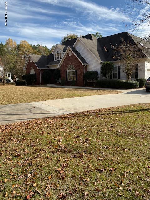 577 Old Popes Ferry Road Juliette, GA 31046 - Photo 3 of 49 a view of house with outdoor space