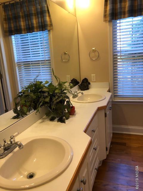577 Old Popes Ferry Road Juliette, GA 31046 - Photo 22 of 49 a bathroom with a sink and a bathtub