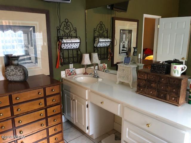 577 Old Popes Ferry Road Juliette, GA 31046 - Photo 24 of 49 a bathroom with a sink and a mirror