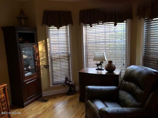 577 Old Popes Ferry Road Juliette, GA 31046 - Photo 29 of 49 a living room with furniture and a window