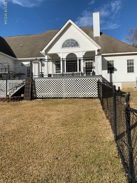 577 Old Popes Ferry Road Juliette, GA 31046 - Photo 38 of 49 a front view of a house with a garden