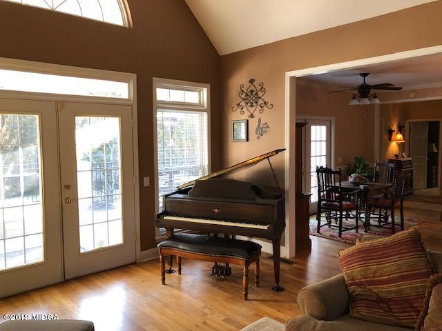 577 Old Popes Ferry Road Juliette, GA 31046 - Photo 10 of 49 a living room with furniture and a window