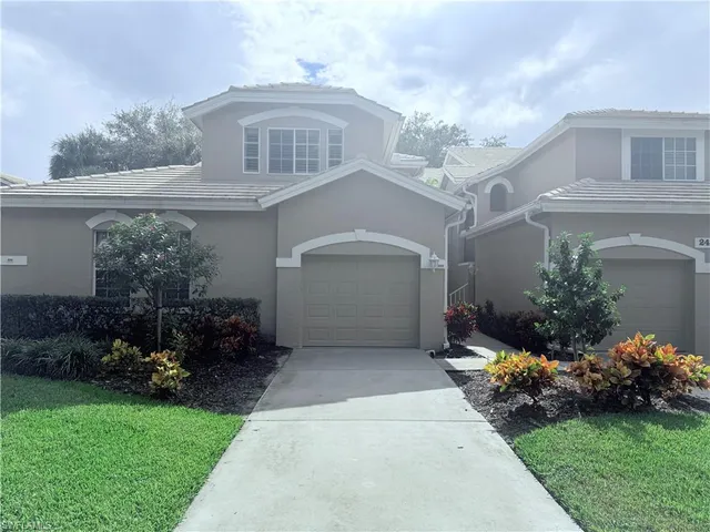 a front view of house with garden