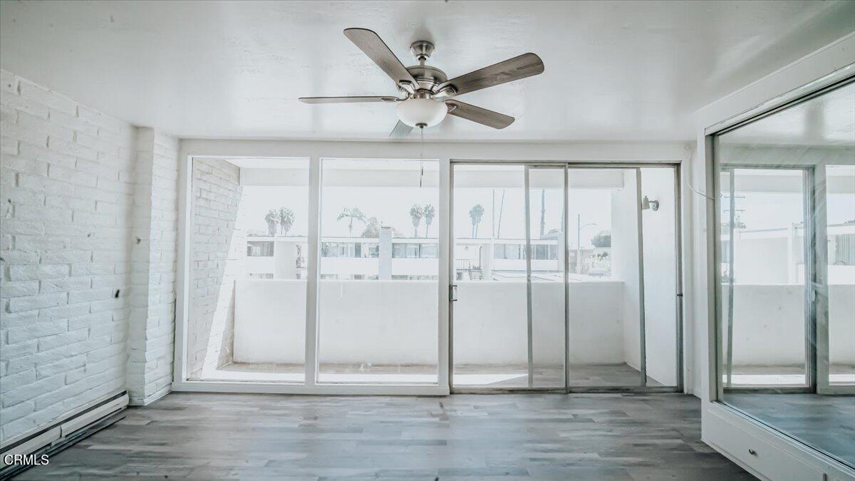1361 Edgewood Way, Unit 61 Oxnard, CA 93030 - Photo 19 of 22 a view of an entryway with wooden floor