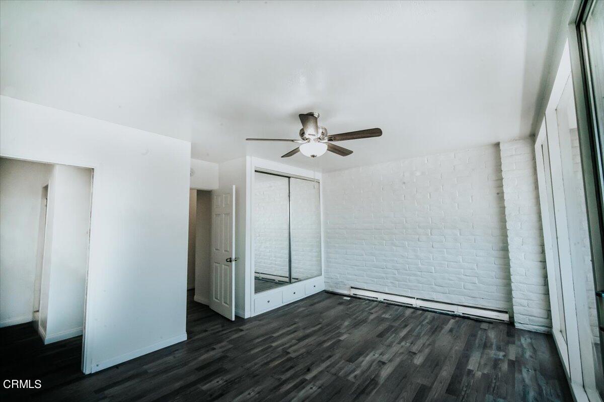 1361 Edgewood Way, Unit 61 Oxnard, CA 93030 - Photo 20 of 22 wooden floor in an empty room with a window
