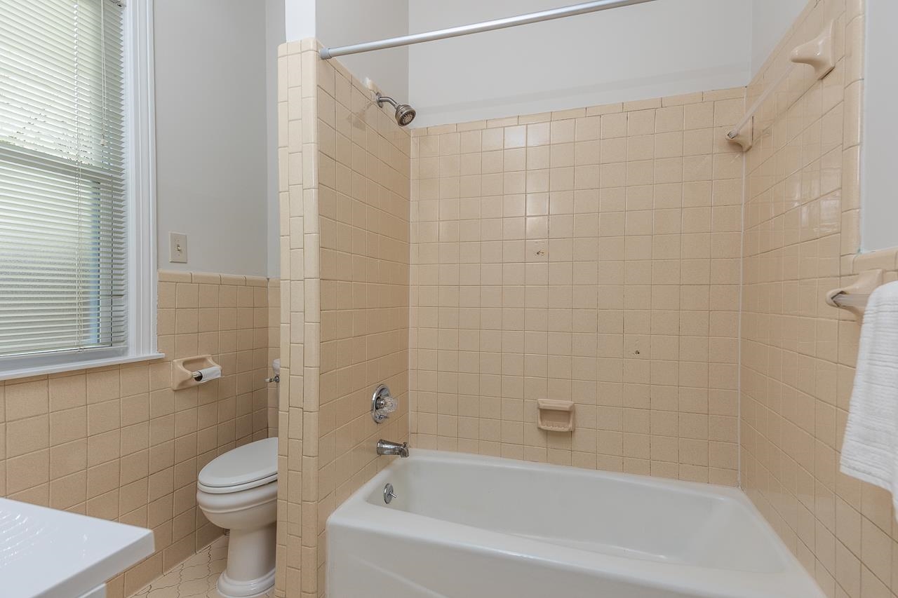 627 Watson Street Memphis, TN 38111 - Photo 18 of 35 a bathroom with a bathtub toilet and sink