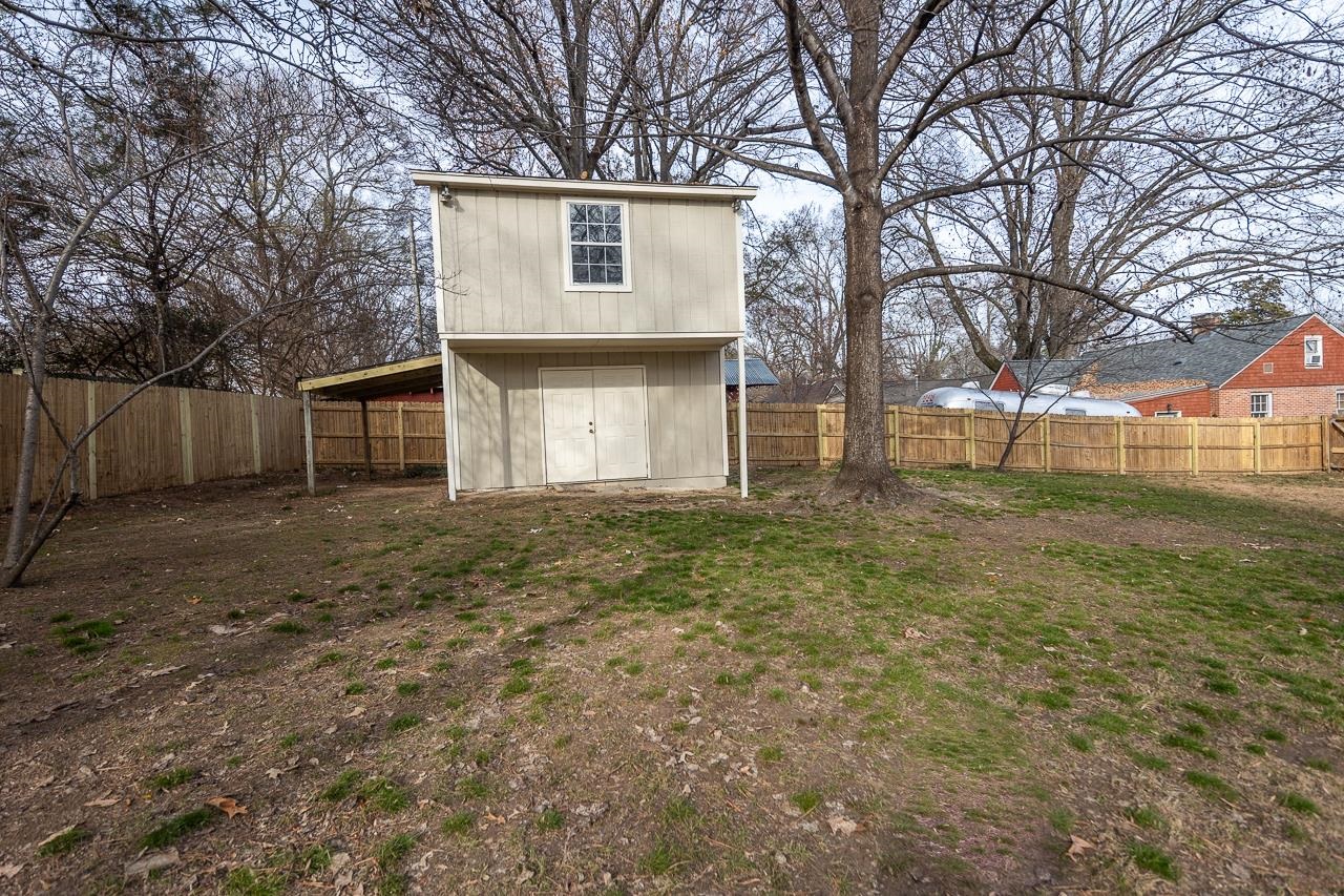 627 Watson Street Memphis, TN 38111 - Photo 26 of 35 a view of a house with a yard