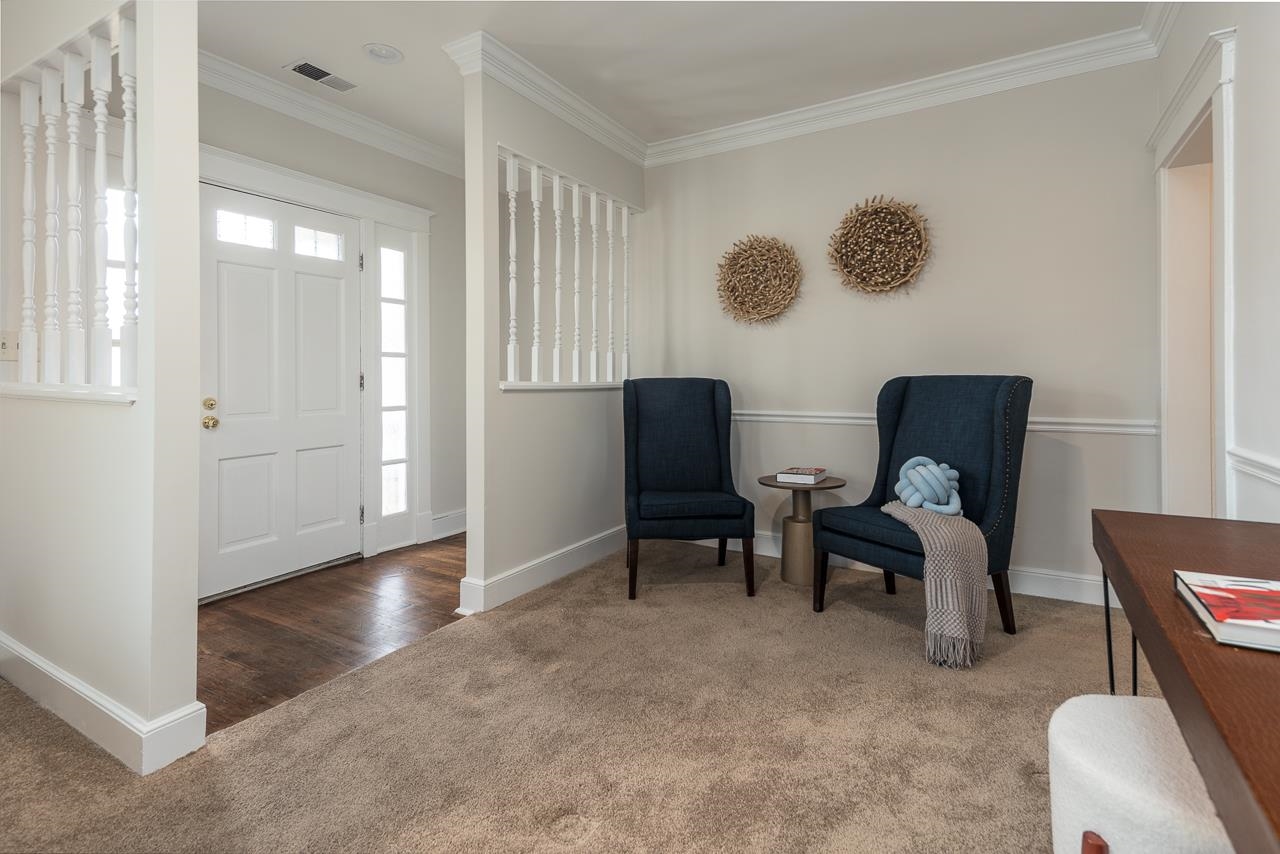 627 Watson Street Memphis, TN 38111 - Photo 3 of 35 a view of a livingroom with furniture and a window
