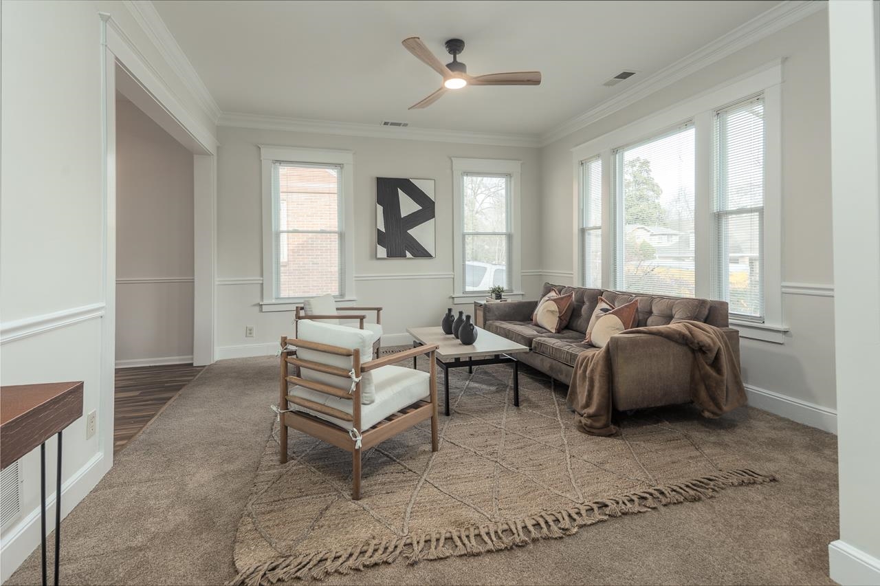 627 Watson Street Memphis, TN 38111 - Photo 4 of 35 a living room with furniture and a large window