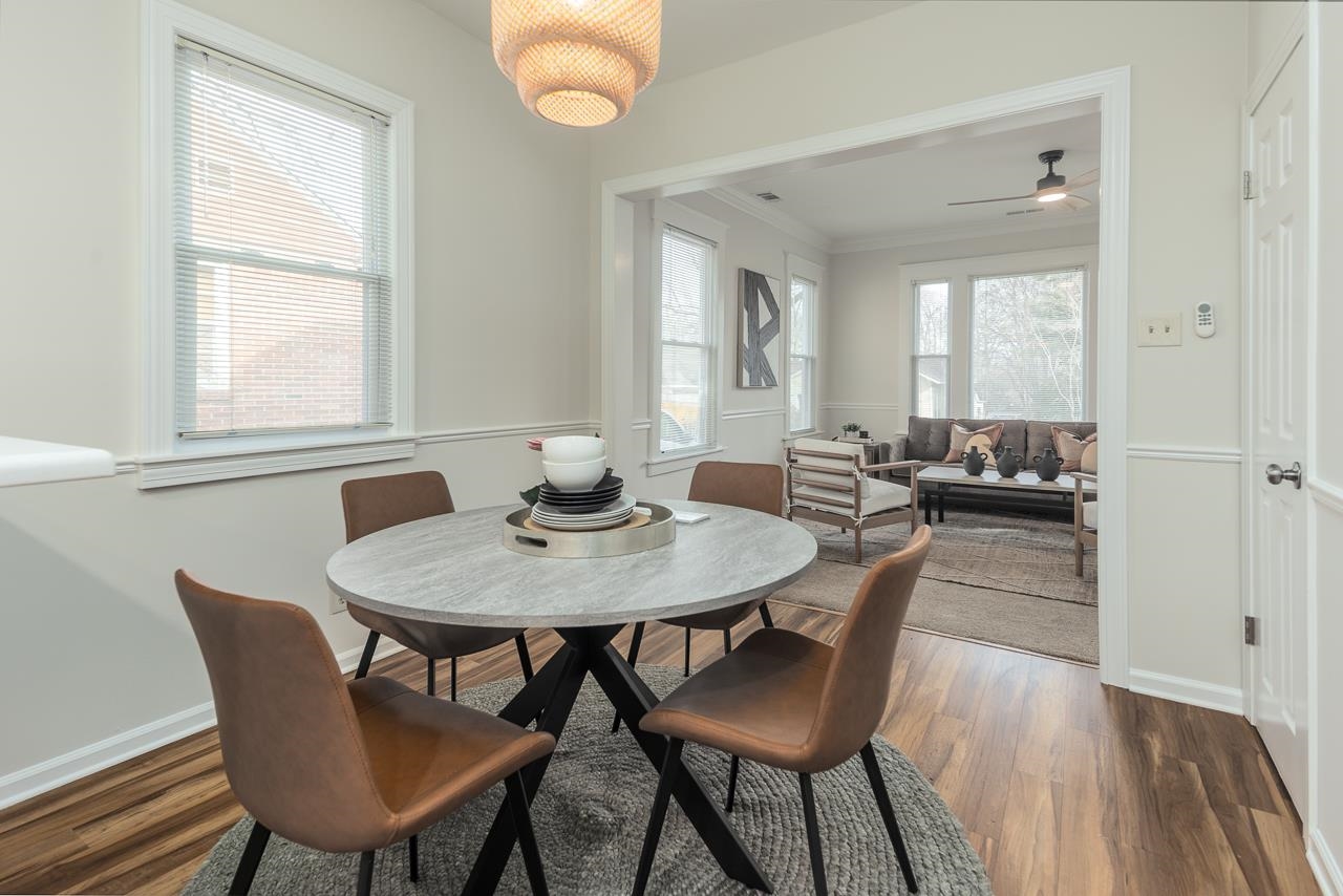 627 Watson Street Memphis, TN 38111 - Photo 7 of 35 a view of a a dining room with furniture window and wooden floor