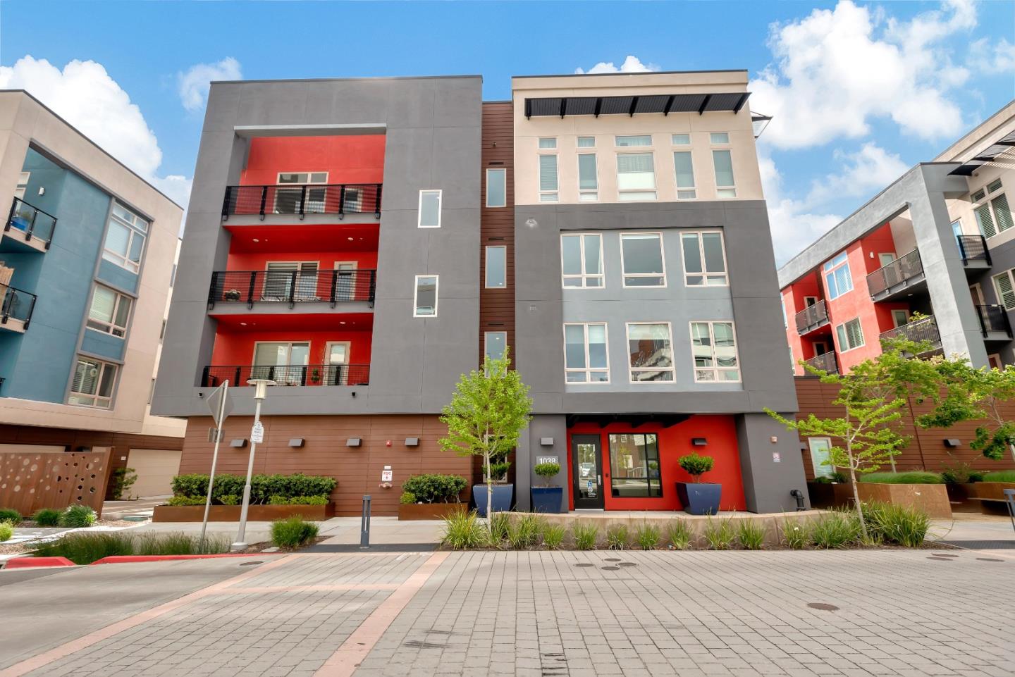 1038 Foster Square Lane, Unit 403 Foster City, CA 94404 - Photo 1 of 28 a front view of multi story residential apartment building