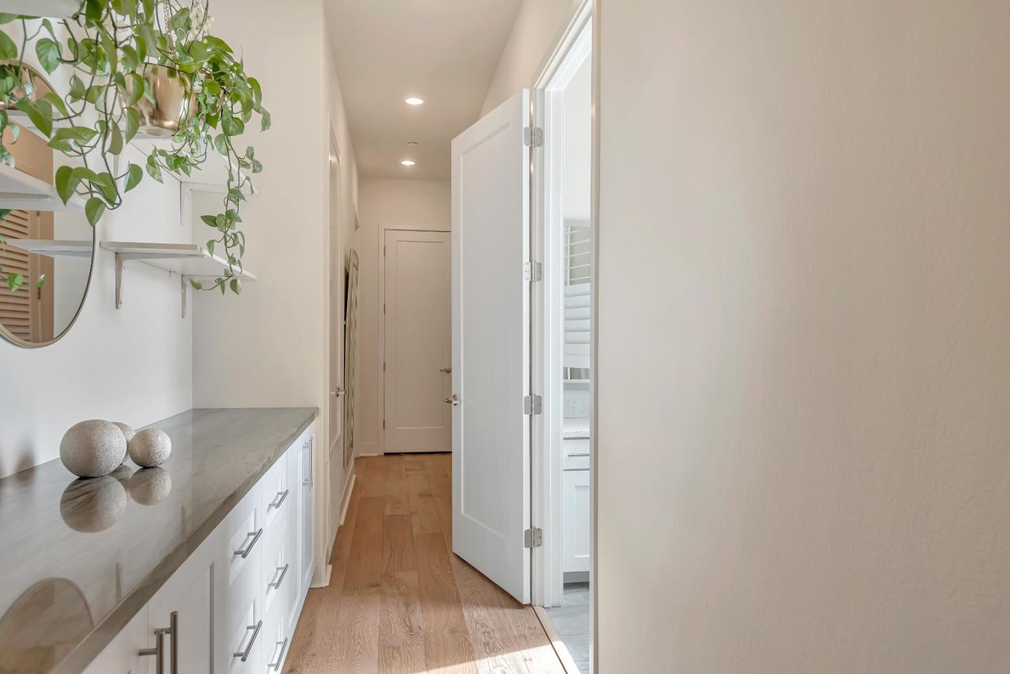 1038 Foster Square Lane, Unit 403 Foster City, CA 94404 - Photo 15 of 28 a bathroom with a granite countertop sink a toilet and shower