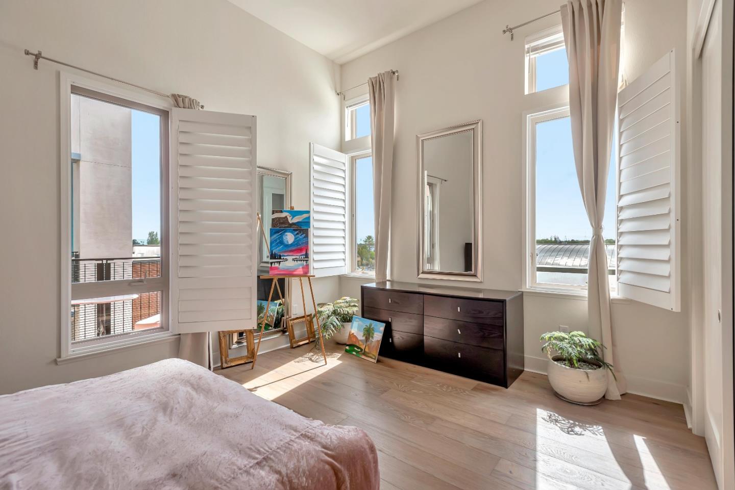 1038 Foster Square Lane, Unit 403 Foster City, CA 94404 - Photo 18 of 28 a bedroom with a bed and windows
