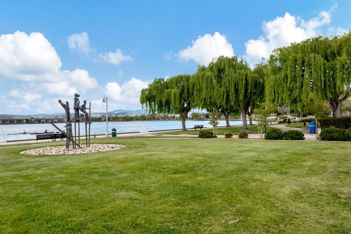 1038 Foster Square Lane, Unit 403 Foster City, CA 94404 - Photo 26 of 28 a view of a swimming pool with a yard
