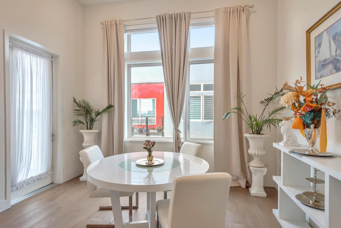 1038 Foster Square Lane, Unit 403 Foster City, CA 94404 - Photo 8 of 28 a view of a dining room with furniture window and wooden floor
