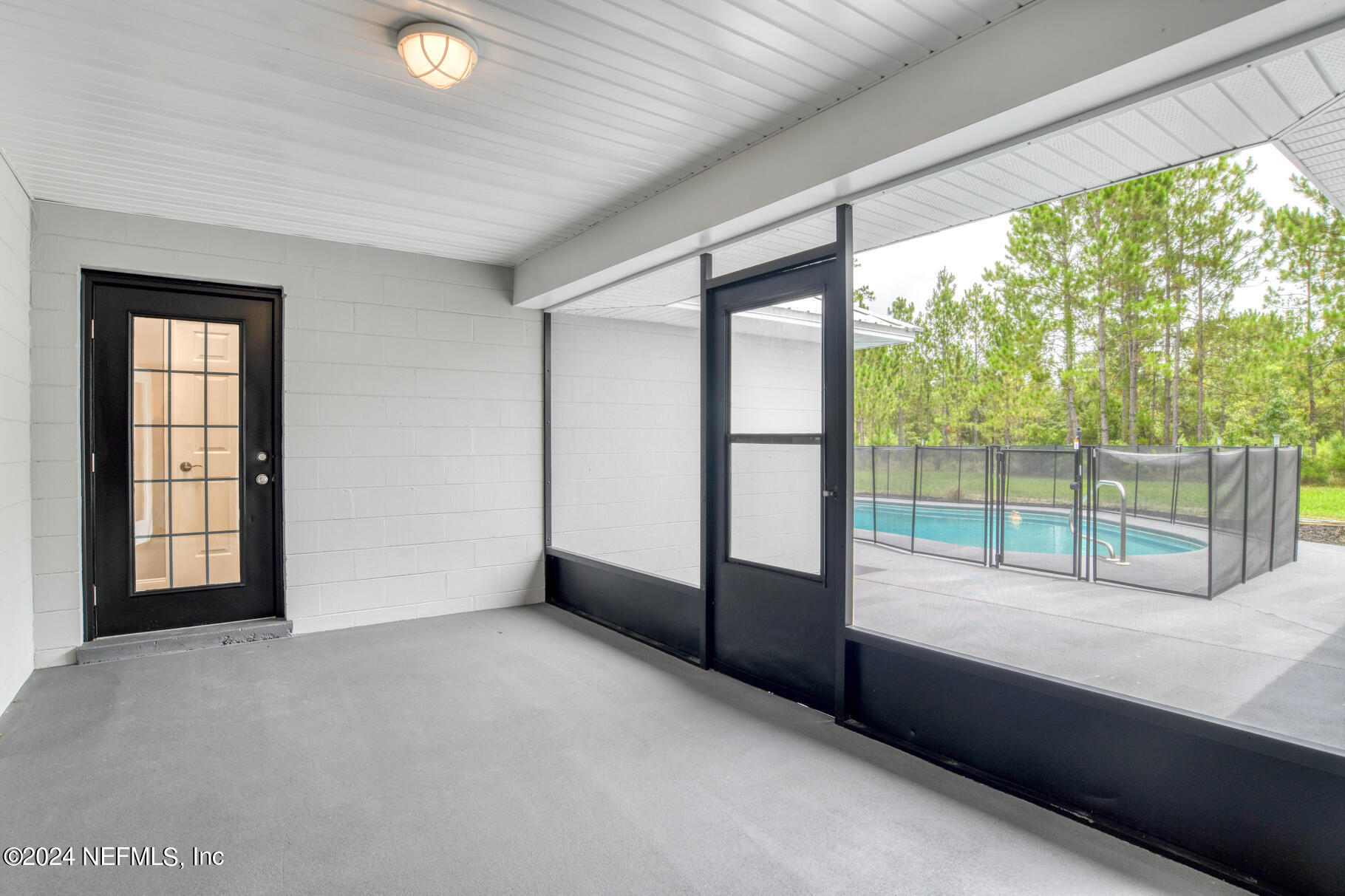 508 Hoover Road Interlachen, FL 32148 - Photo 16 of 42 Screened porch