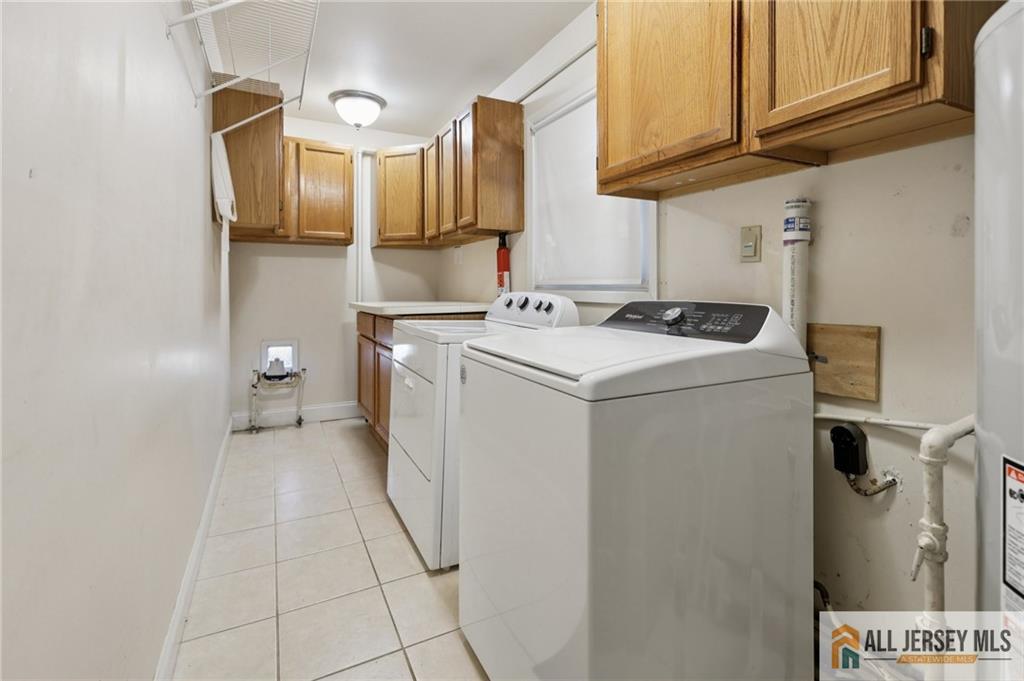 1 Landry Road Somerset, NJ 08873 - Photo 11 of 17 a utility room with dryer and washer