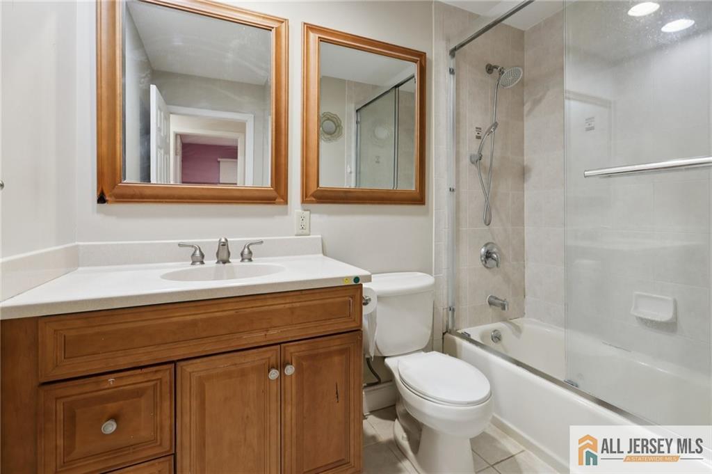 1 Landry Road Somerset, NJ 08873 - Photo 12 of 17 a bathroom with a sink toilet vanity and shower