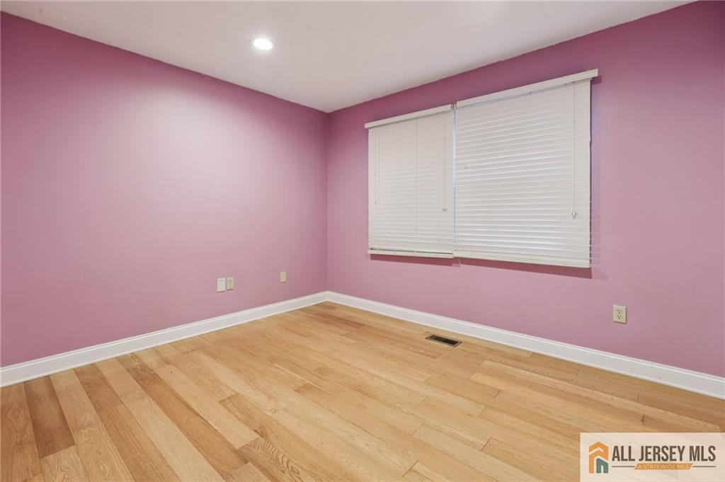 1 Landry Road Somerset, NJ 08873 - Photo 13 of 17 a view of an empty room with a window