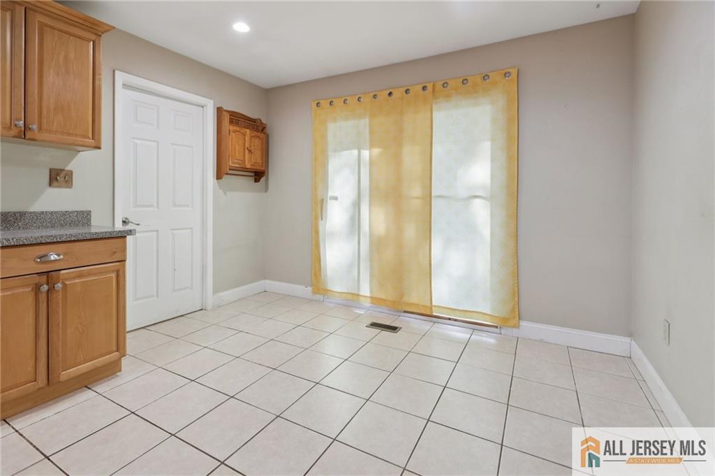 1 Landry Road Somerset, NJ 08873 - Photo 10 of 17 a view of an empty room and window