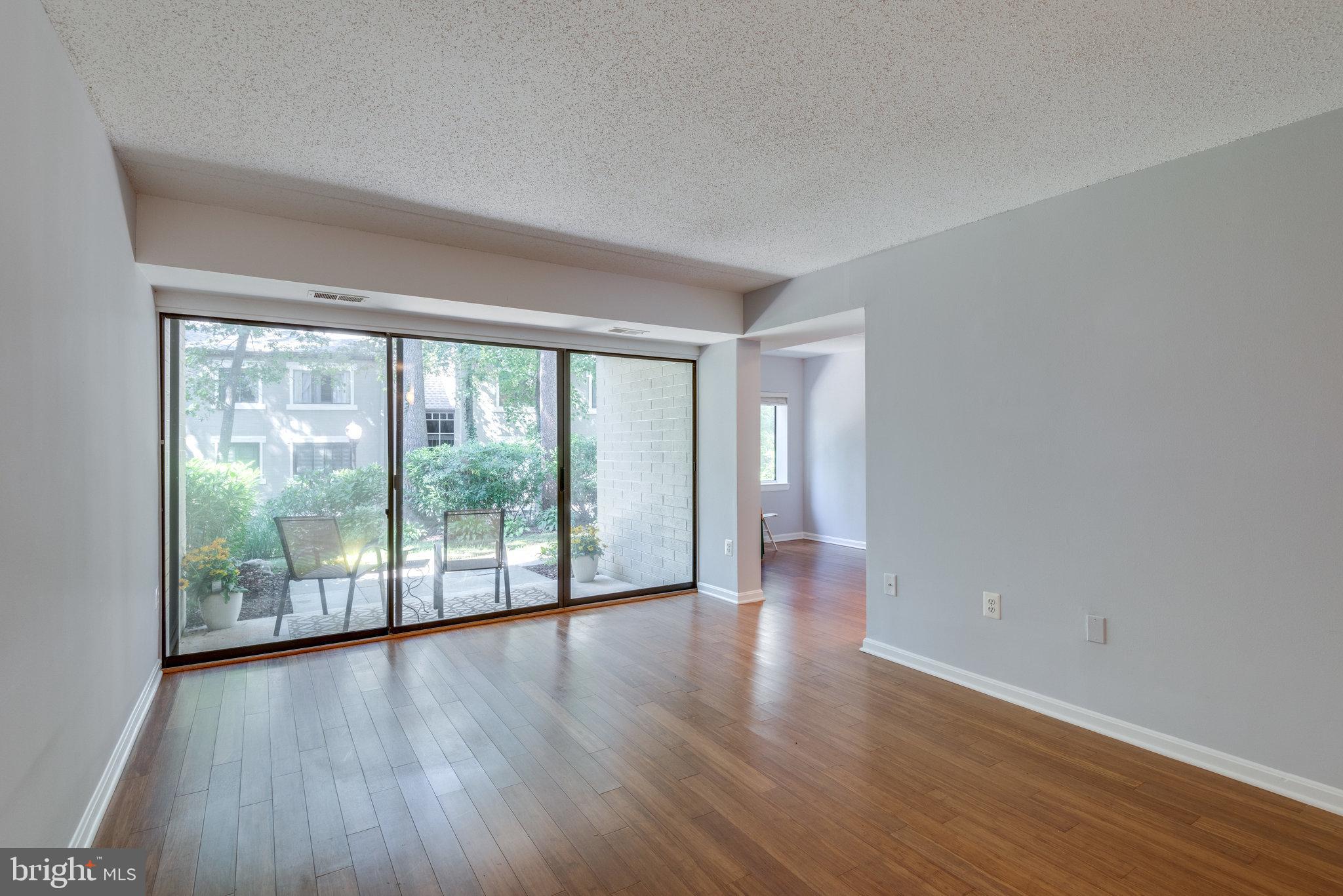 11733 Ledura Court, Unit T2 Reston, VA 20191 - Photo 22 of 77 Bamboo Flooring through out this Living Area