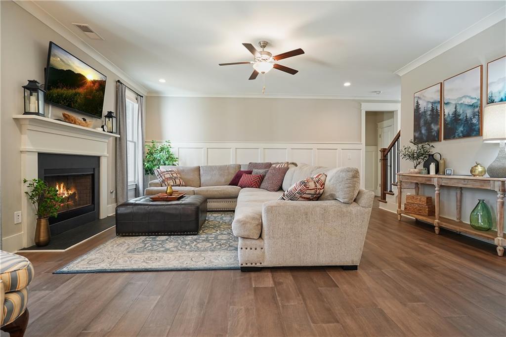6243 Allen Ivey Road Mableton, GA 30126 - Photo 16 of 46 a living room with furniture fireplace and flat screen tv