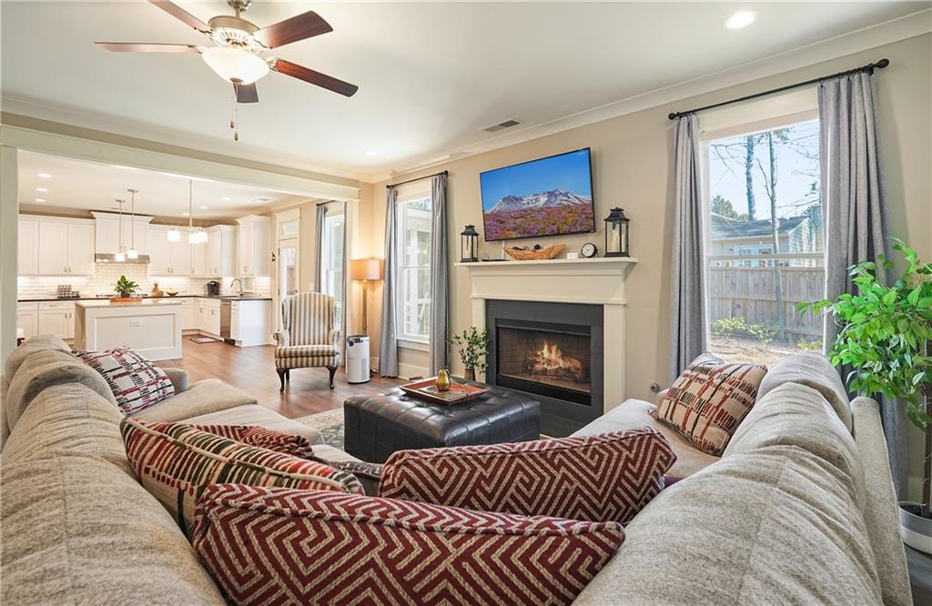 6243 Allen Ivey Road Mableton, GA 30126 - Photo 17 of 46 a living room with furniture fireplace and a large window