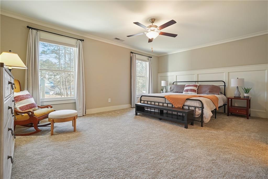 6243 Allen Ivey Road Mableton, GA 30126 - Photo 30 of 46 a bedroom with furniture and a large window