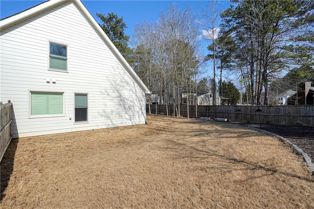 6243 Allen Ivey Road Mableton, GA 30126 - Photo 45 of 46 a view of a backyard of the house