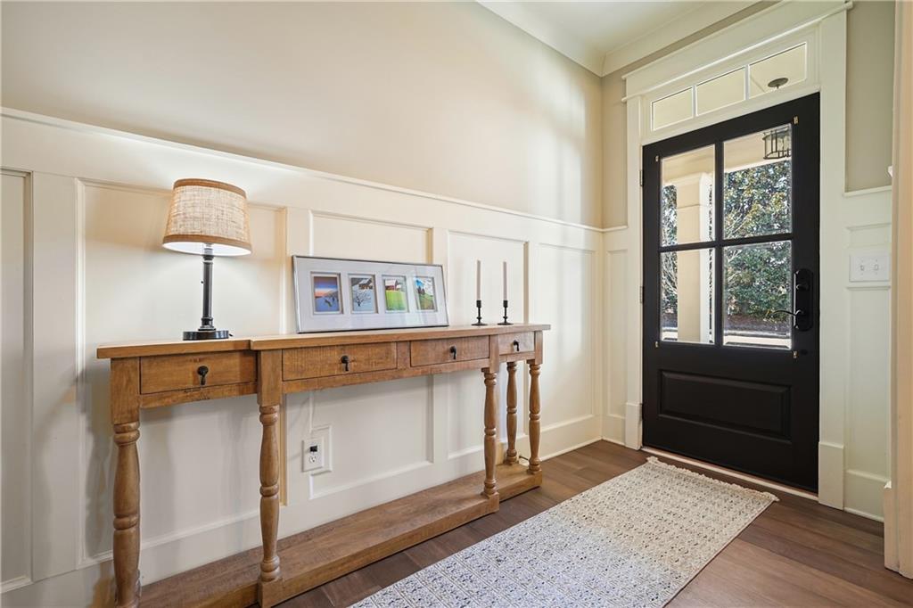 6243 Allen Ivey Road Mableton, GA 30126 - Photo 5 of 46 a view of a hallway with windows and cabinet