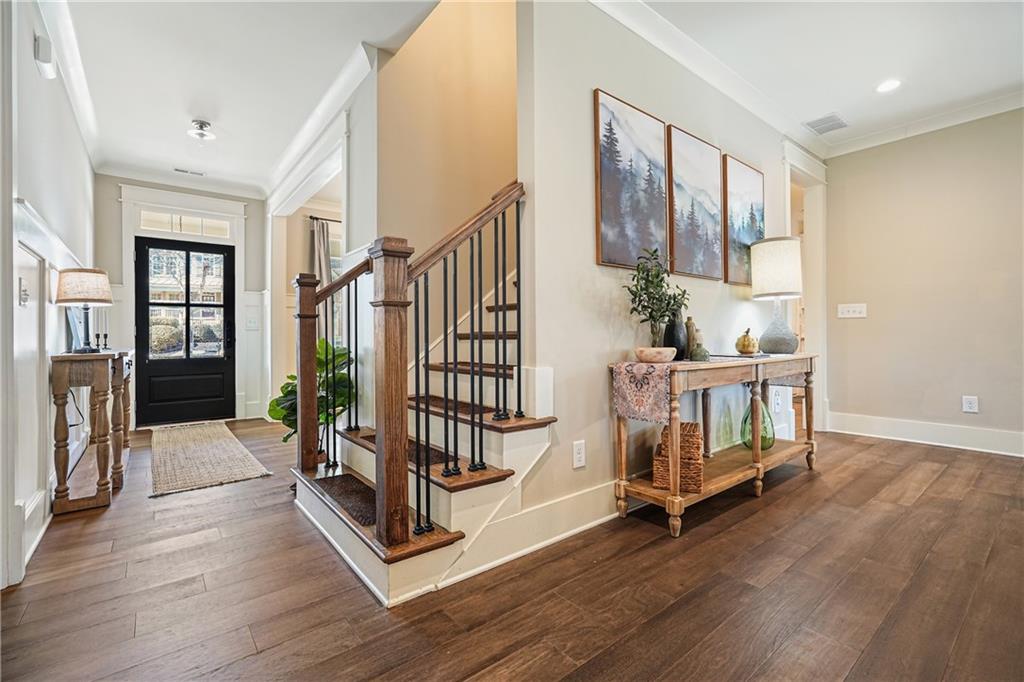 6243 Allen Ivey Road Mableton, GA 30126 - Photo 6 of 46 a view of an entryway with wooden floor and windows