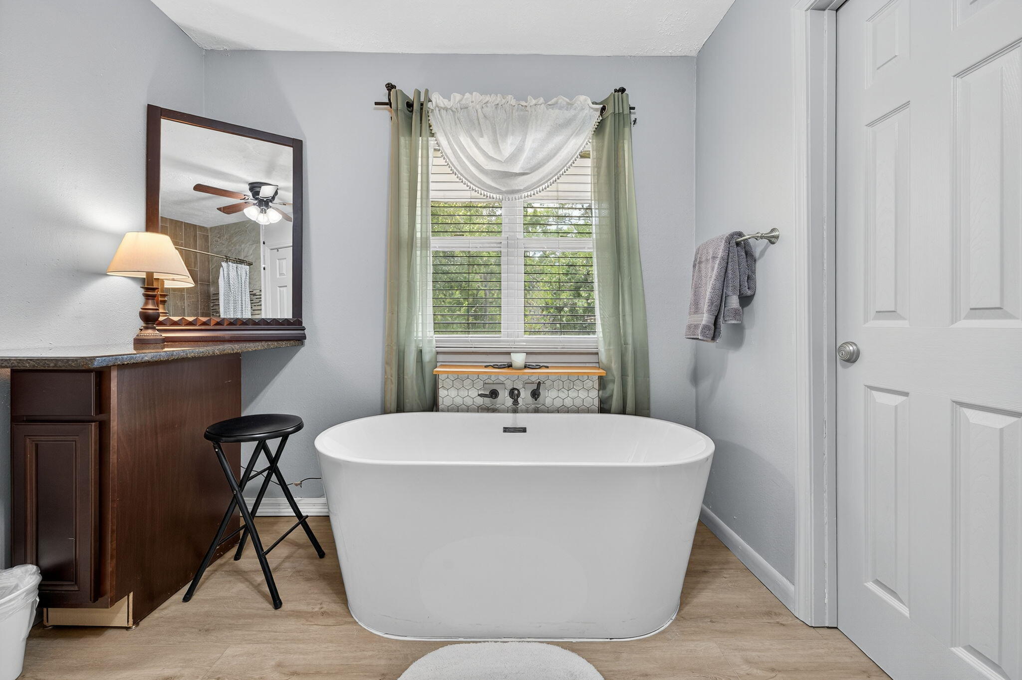 14 6th Street Shalimar, FL 32579 - Photo 28 of 64 a white bath tub sitting next to a window
