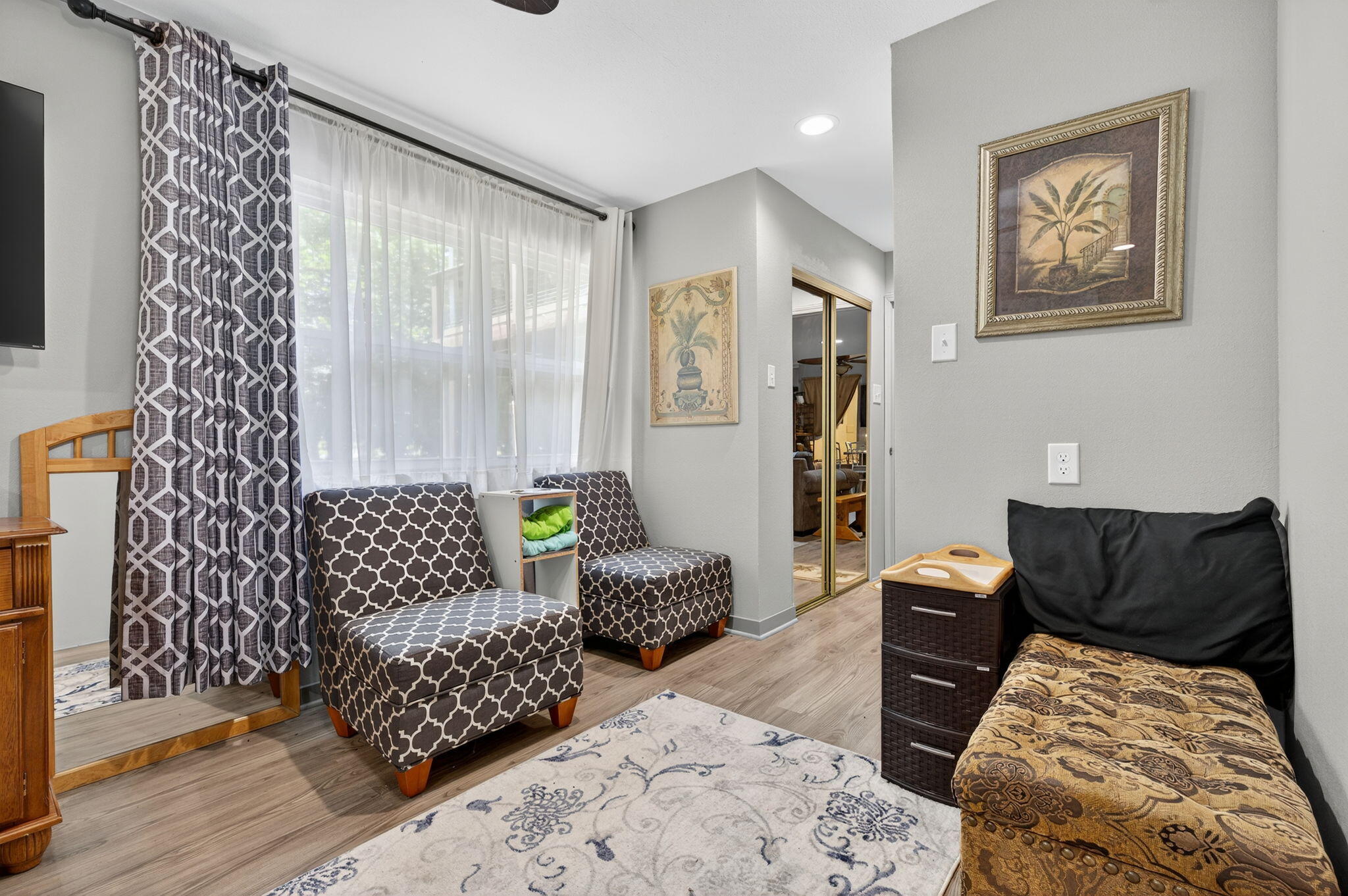 14 6th Street Shalimar, FL 32579 - Photo 52 of 64 a bedroom with a bed and wooden floor