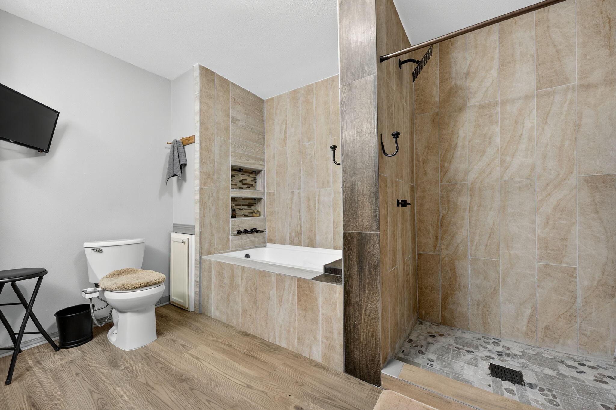 14 6th Street Shalimar, FL 32579 - Photo 55 of 64 a bathroom with a toilet a sink and shower