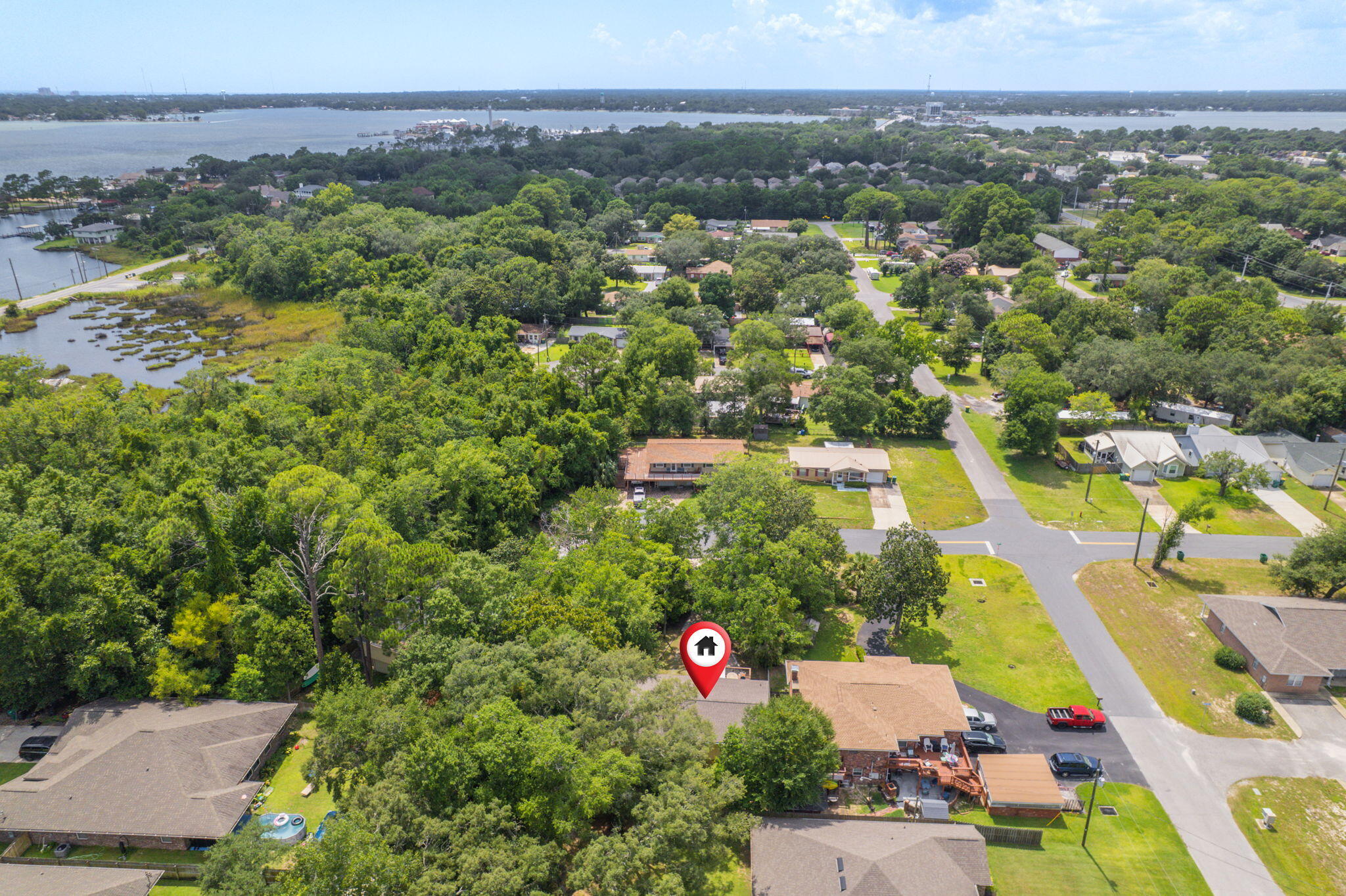 14 6th Street Shalimar, FL 32579 - Photo 62 of 64 an aerial view of residential houses with outdoor space and trees