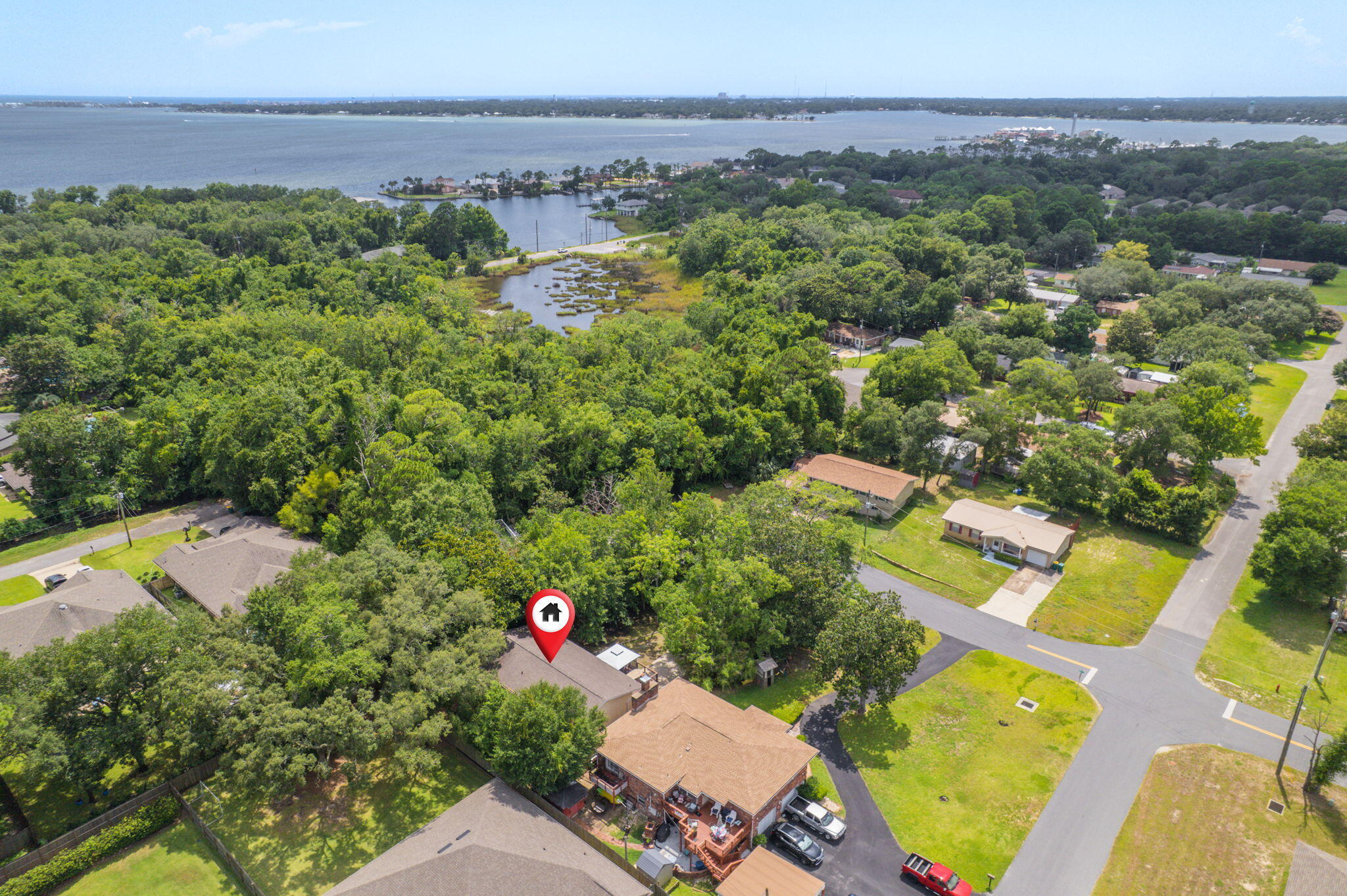 14 6th Street Shalimar, FL 32579 - Photo 63 of 64 an aerial view of a house with a garden