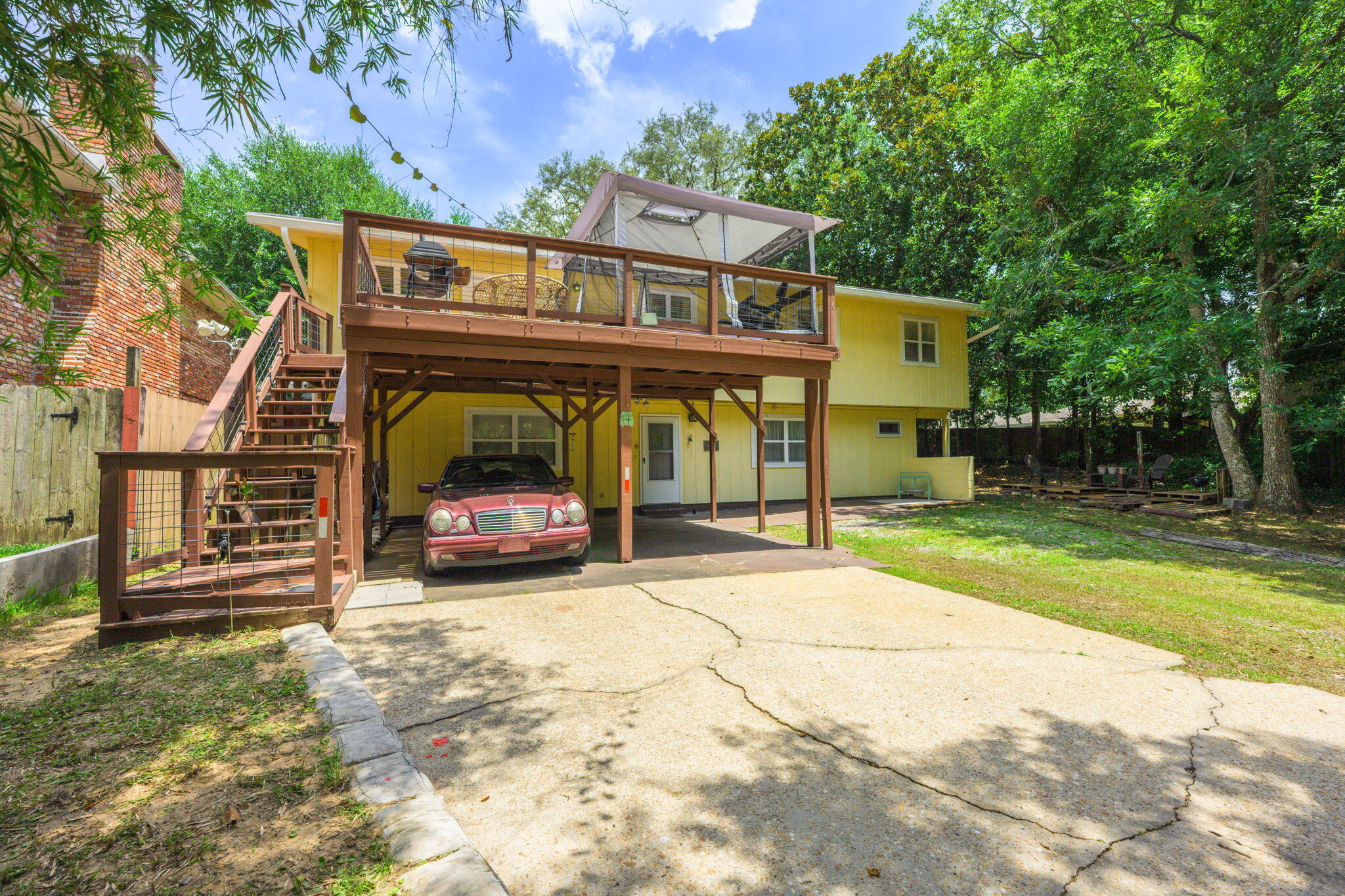 14 6th Street Shalimar, FL 32579 - Photo 7 of 64 a view of a car park in front of house