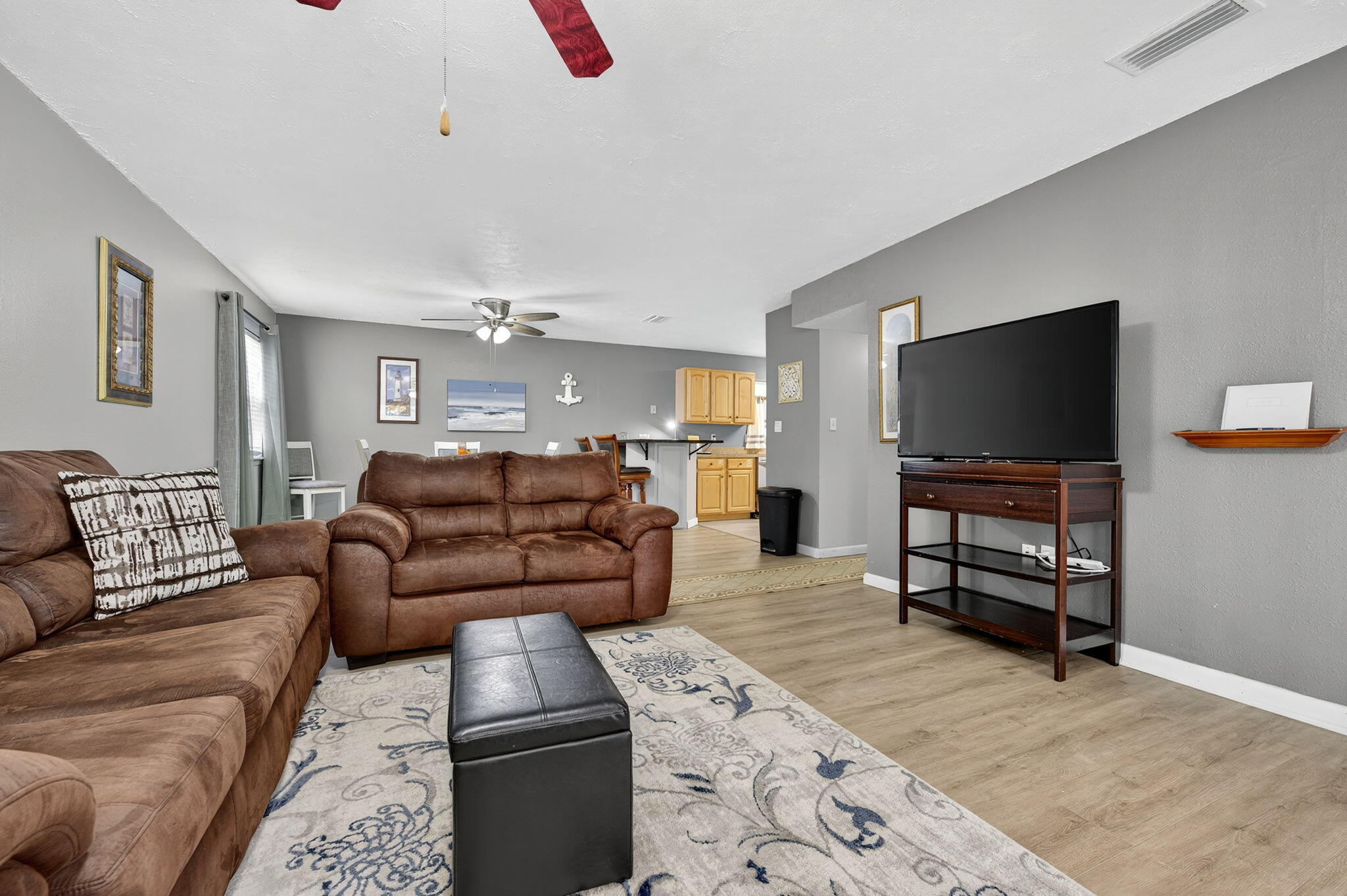 14 6th Street Shalimar, FL 32579 - Photo 8 of 64 a living room with furniture and a flat screen tv