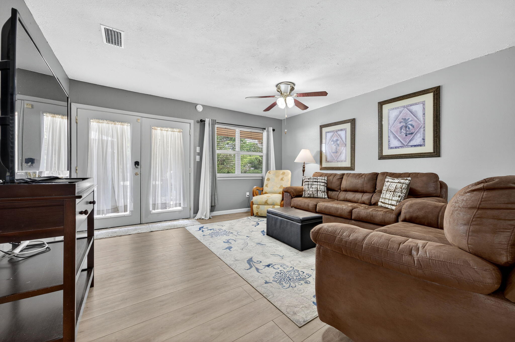 14 6th Street Shalimar, FL 32579 - Photo 9 of 64 a living room with furniture ceiling and a window