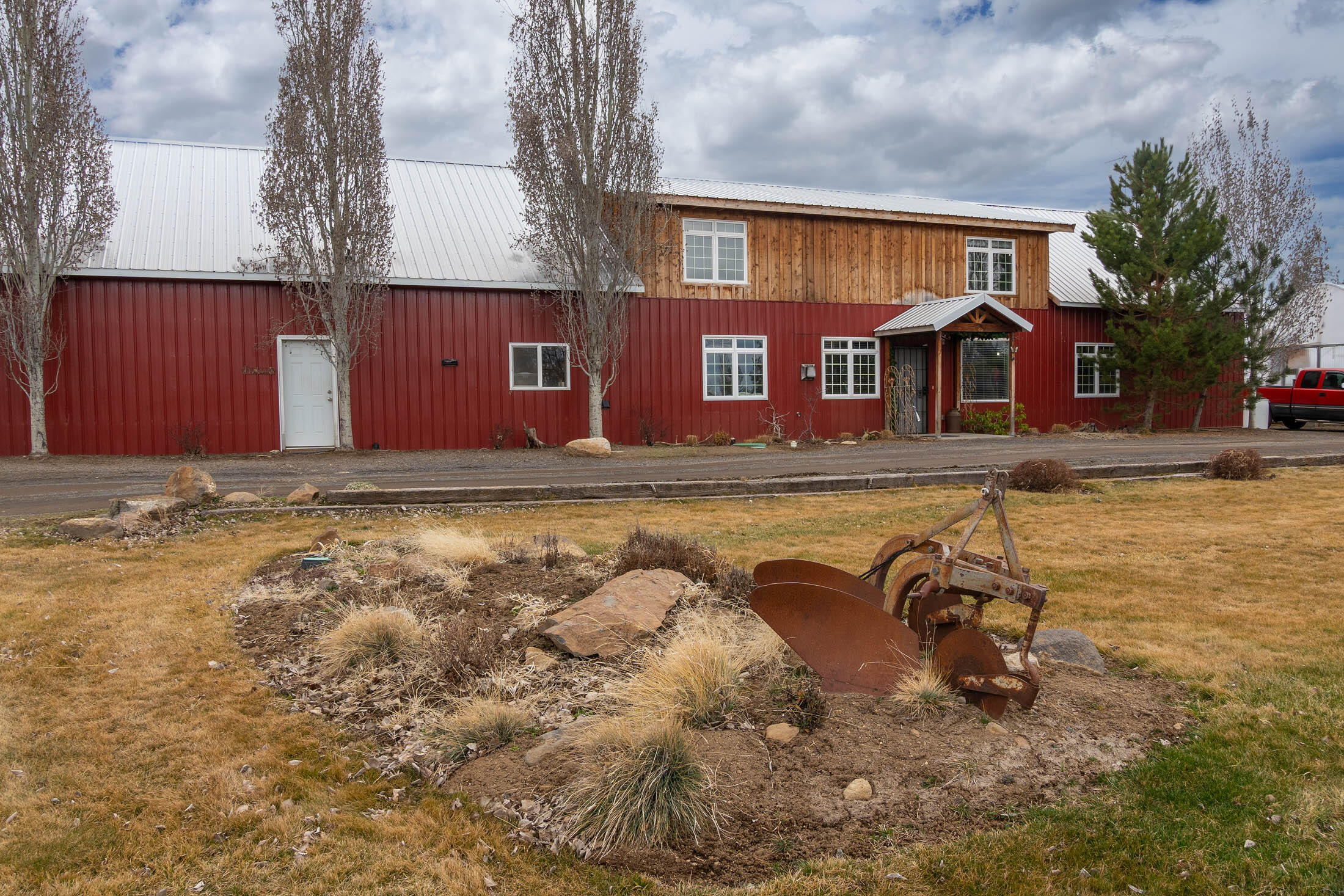 19825 Connarn Road Bend, OR 97703 - Photo 44 of 46 a view of a house with a yard