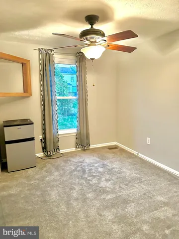 a view of a room with a chandeliers
