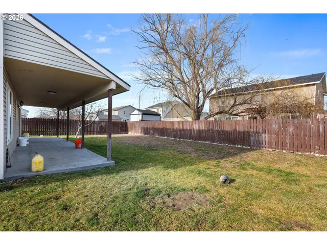 a swimming pool with wooden fence