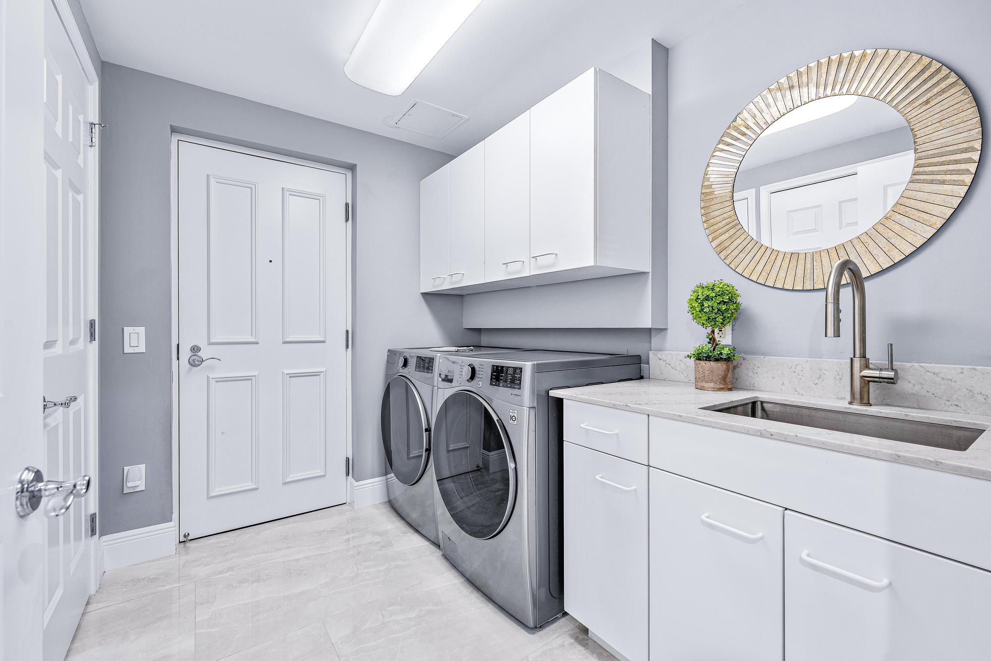 500 Highway 1, Unit 201 Jupiter, FL 33477 - Photo 27 of 38 a view of a kitchen and utility room